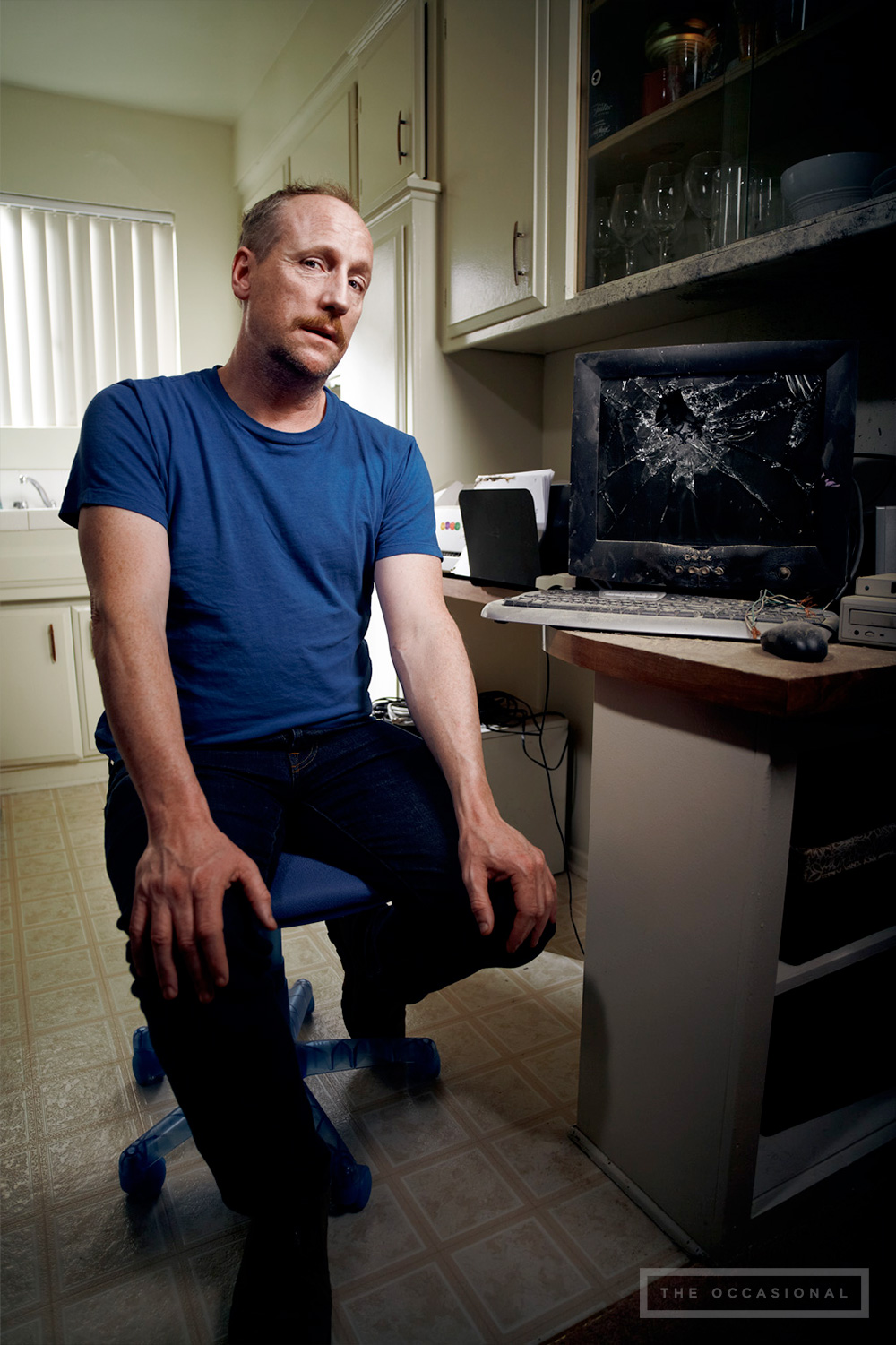  White in front of his ill-fated computer, which sits atop a desk still covered in soot. "Not a day goes by that I don't unplug it and plug it back in, hoping it will restart," White confided. "Alas, that wasn't in Y2K's plans."&nbsp; 