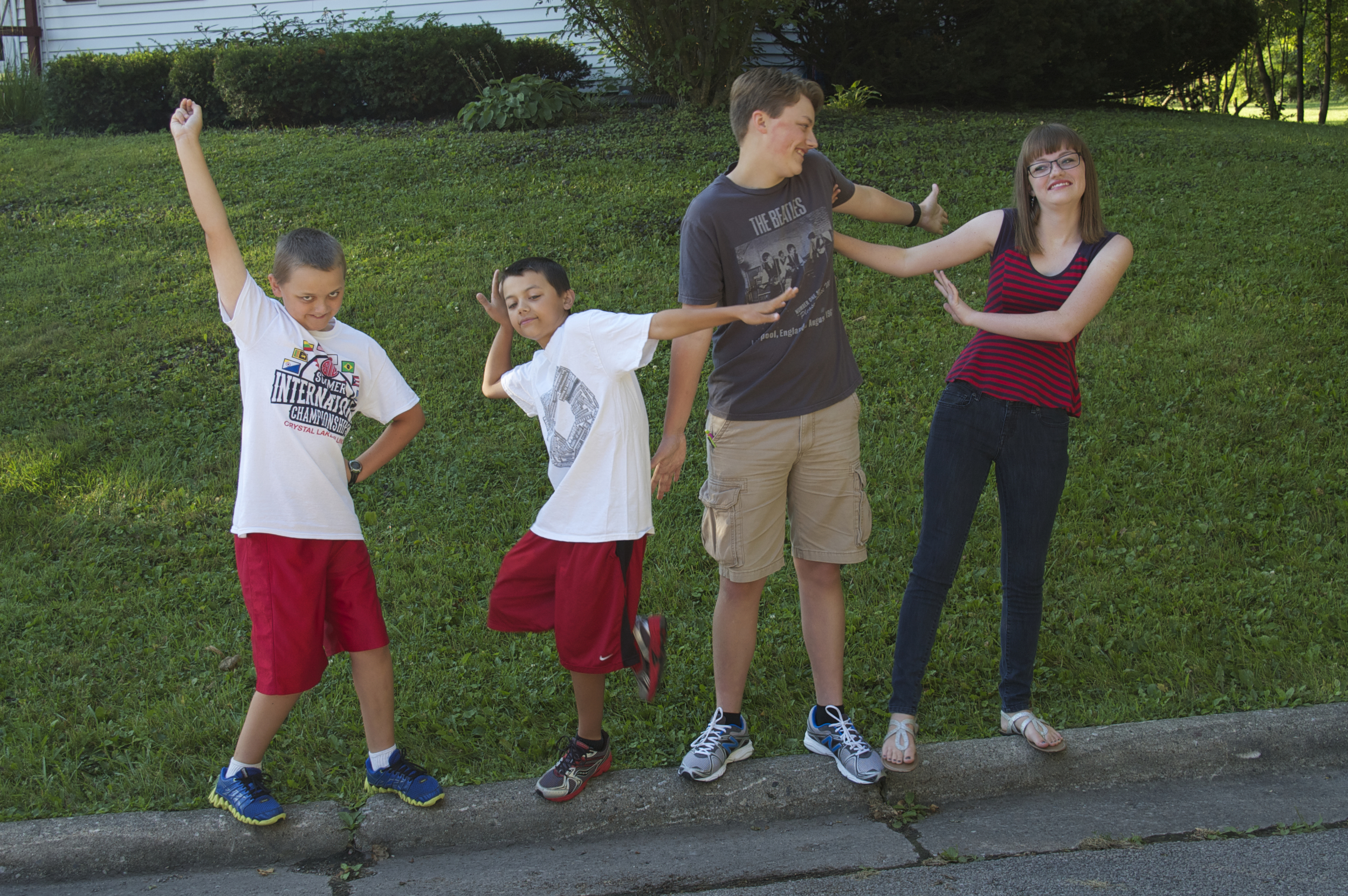 Whenever we pose the kids for the first day of school photo (and most other times, too), we end with something goofy. This is what we got. This probably represents who they are better than standing up straight and smiling!