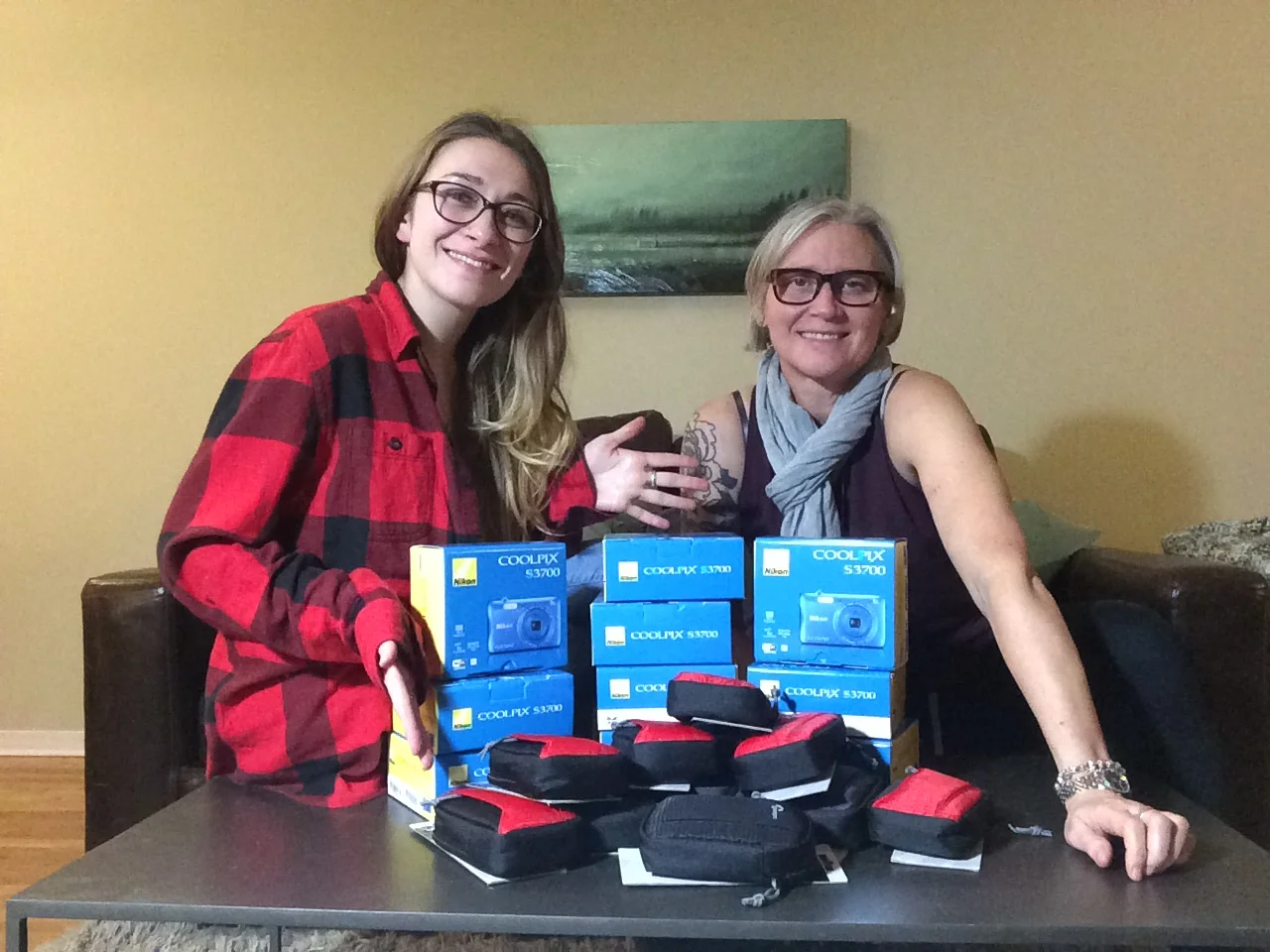 Here I am with Cate Cameron, Director of the organisation and the Nikon Coolpix S3700 cameras that were used for the project