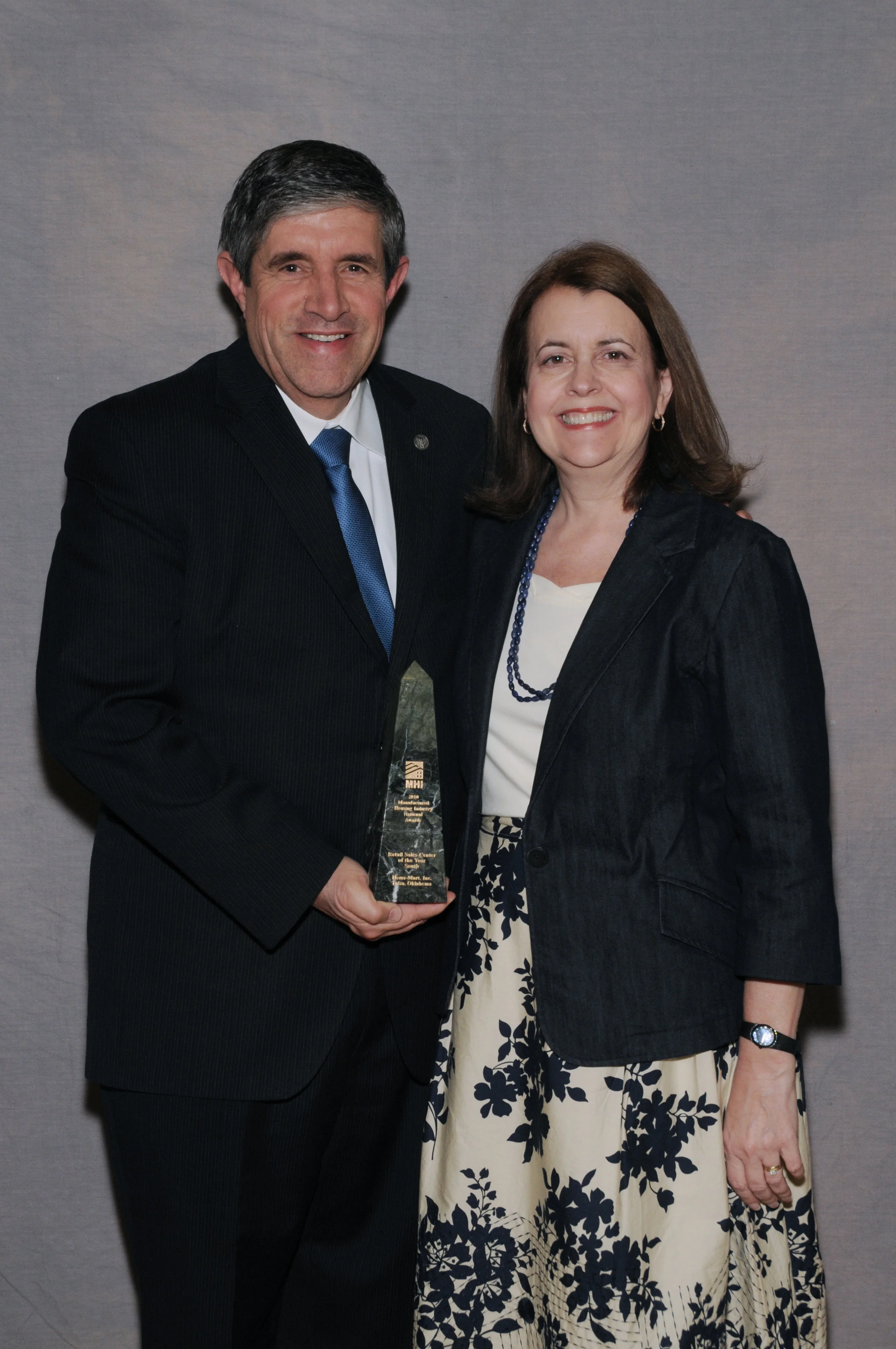 The Gormans with one of their many national awards from the Manufactured Housing Institute