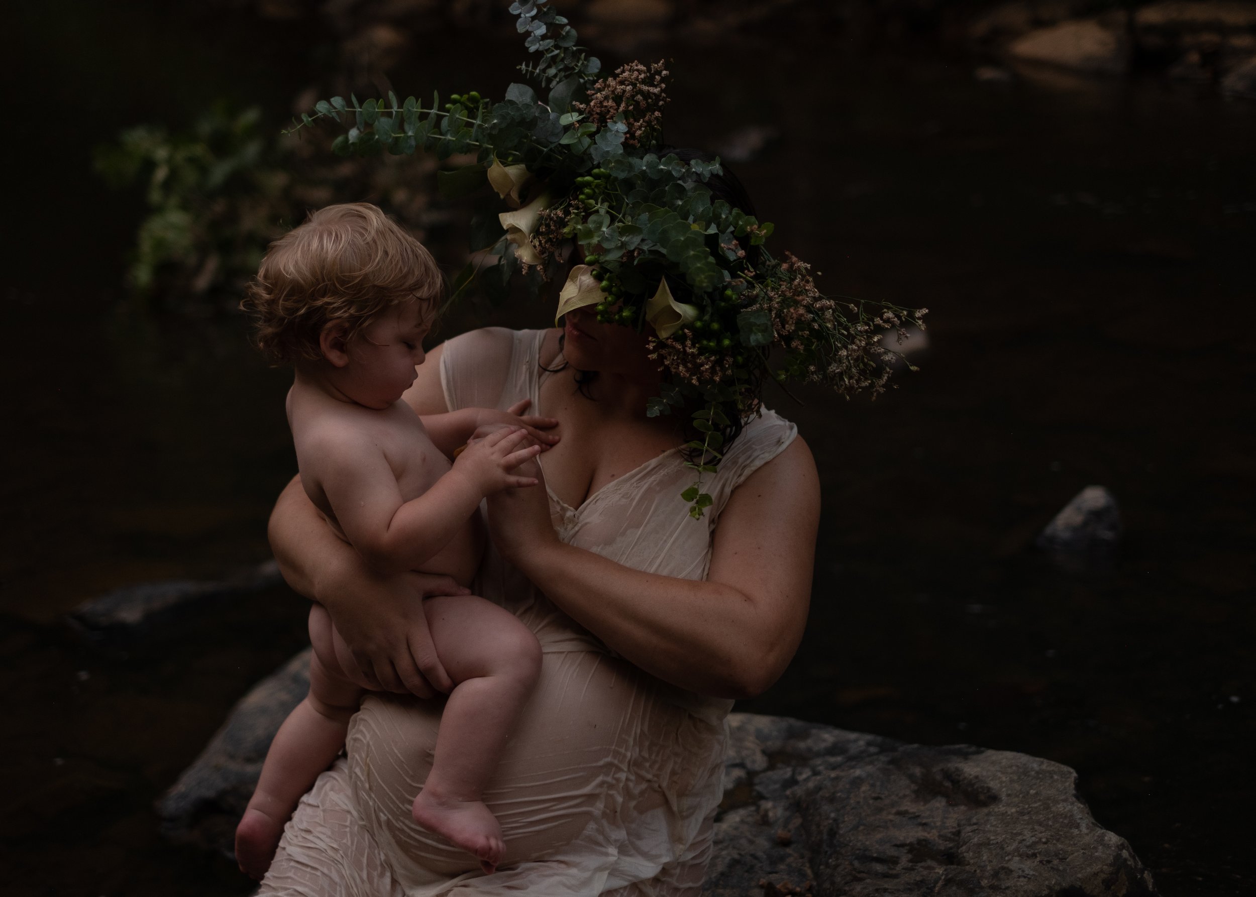 mother holding son mama vivify session