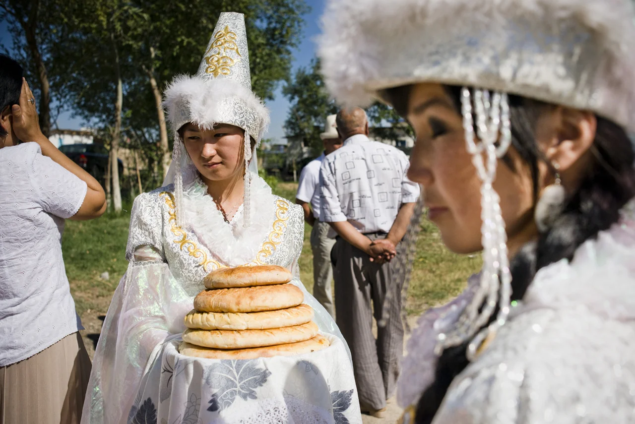 A few girls wait for a group of Tajik students to arrive in the demarcated area between the borders of Tajikistan and Kyrgyzstan. The “peace caravan” was an event hosted by ACTED and was meant to bring Tajik students in to Kyrgyzstan to …