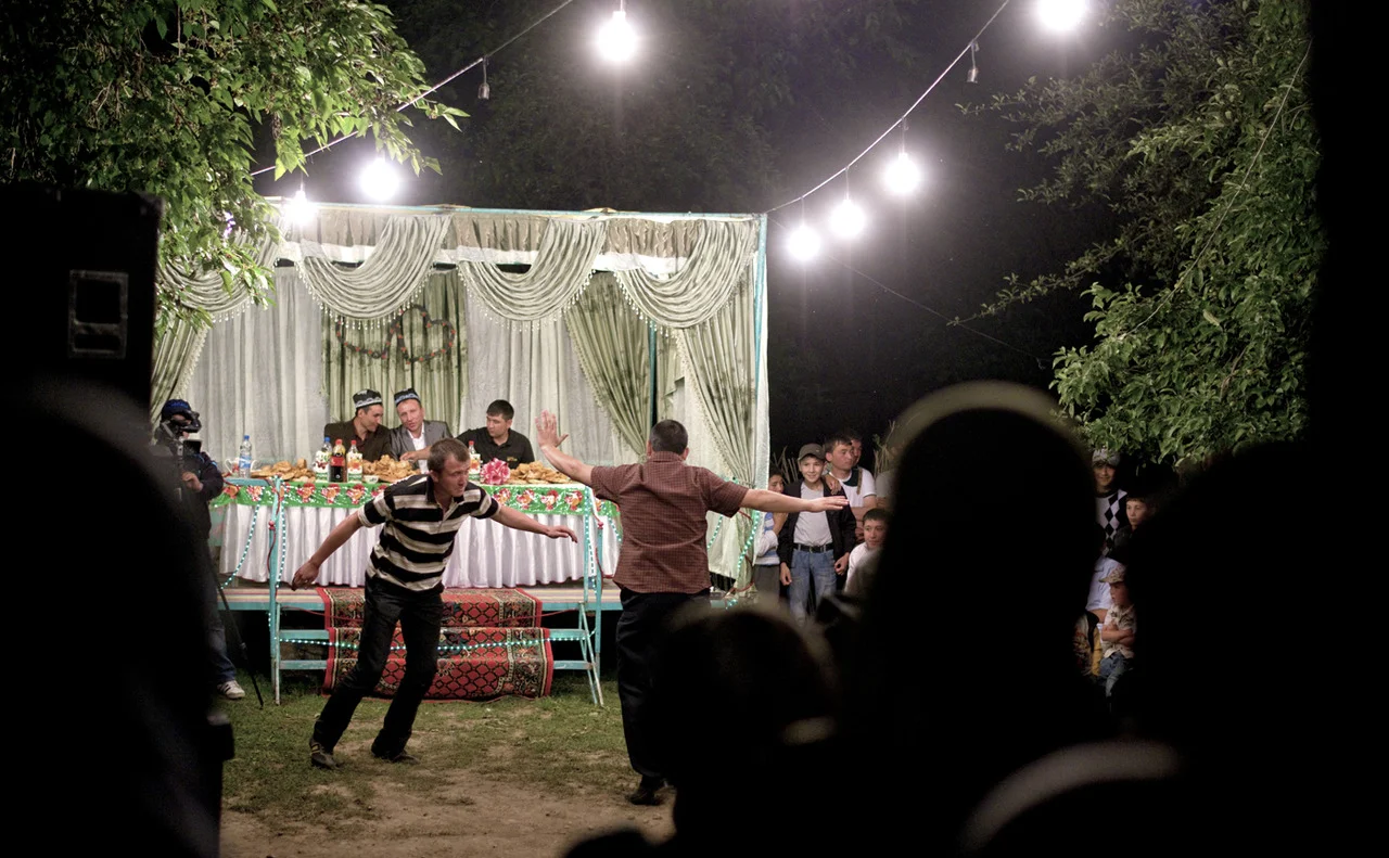 Two men dance at an Uzbek wedding that Amanda, Emily and I came across on Saturday night in Arslanbob. There were predominantly males at the event that happened after the marriage ceremony during the day. The groom and his best man sat at the table …