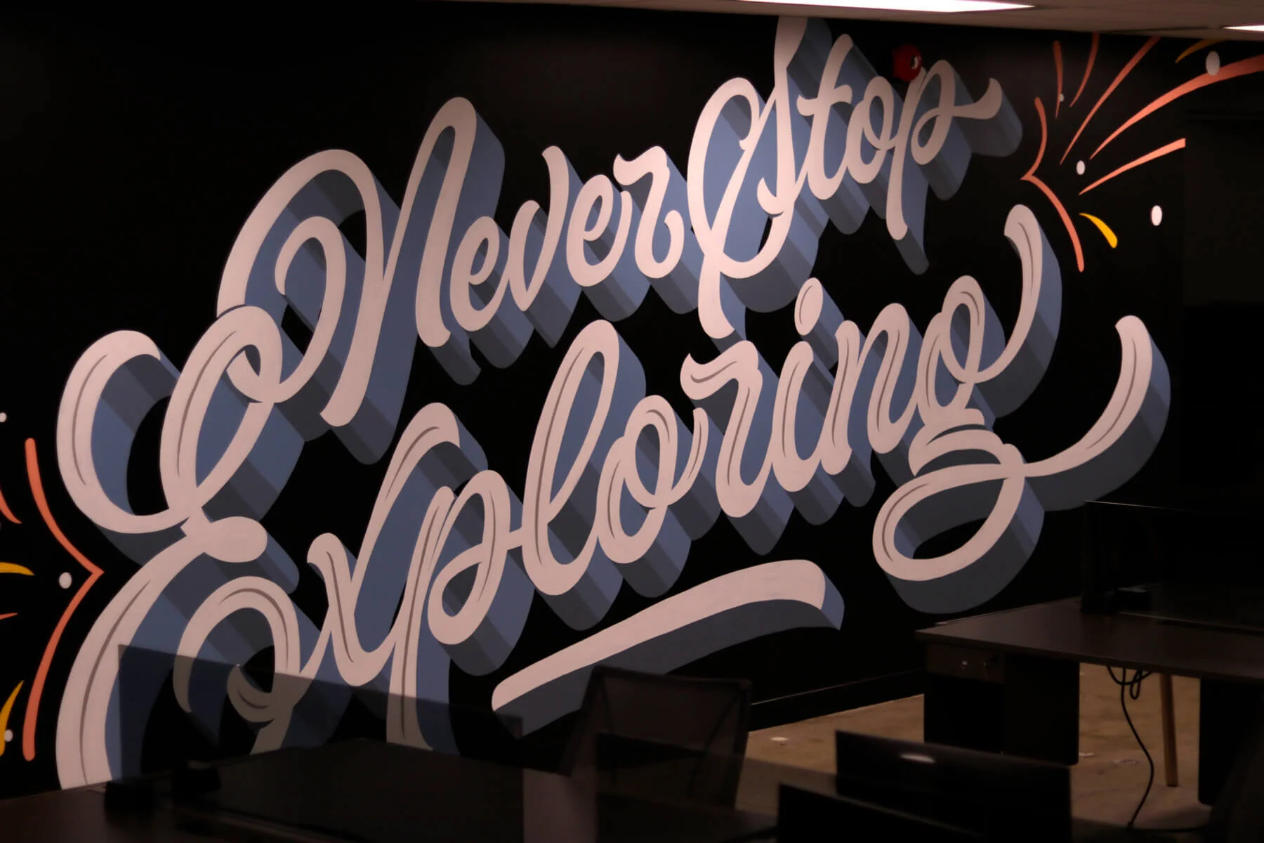 Finished shot of the “Never Stop Exploring” mural  (difficult to photograph entirely)