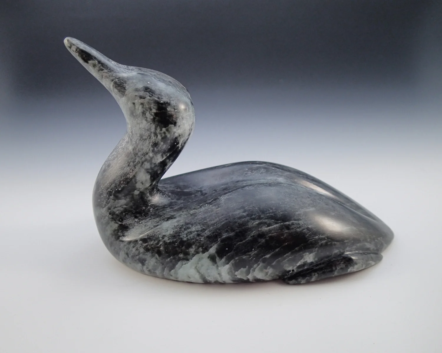 "Grounded" soapstone loon with feet, 9 cm