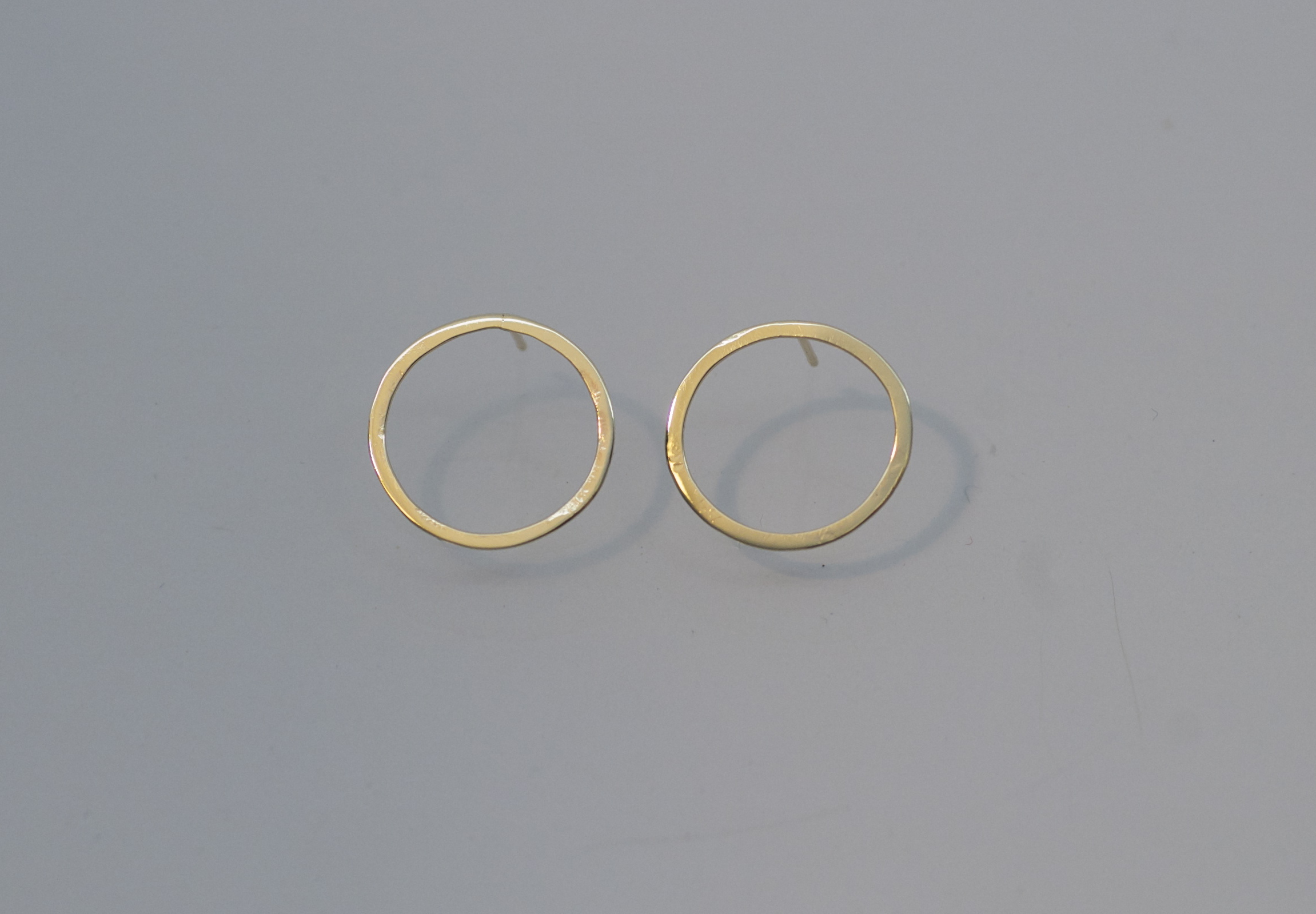 gold hoop earrings .jpg
