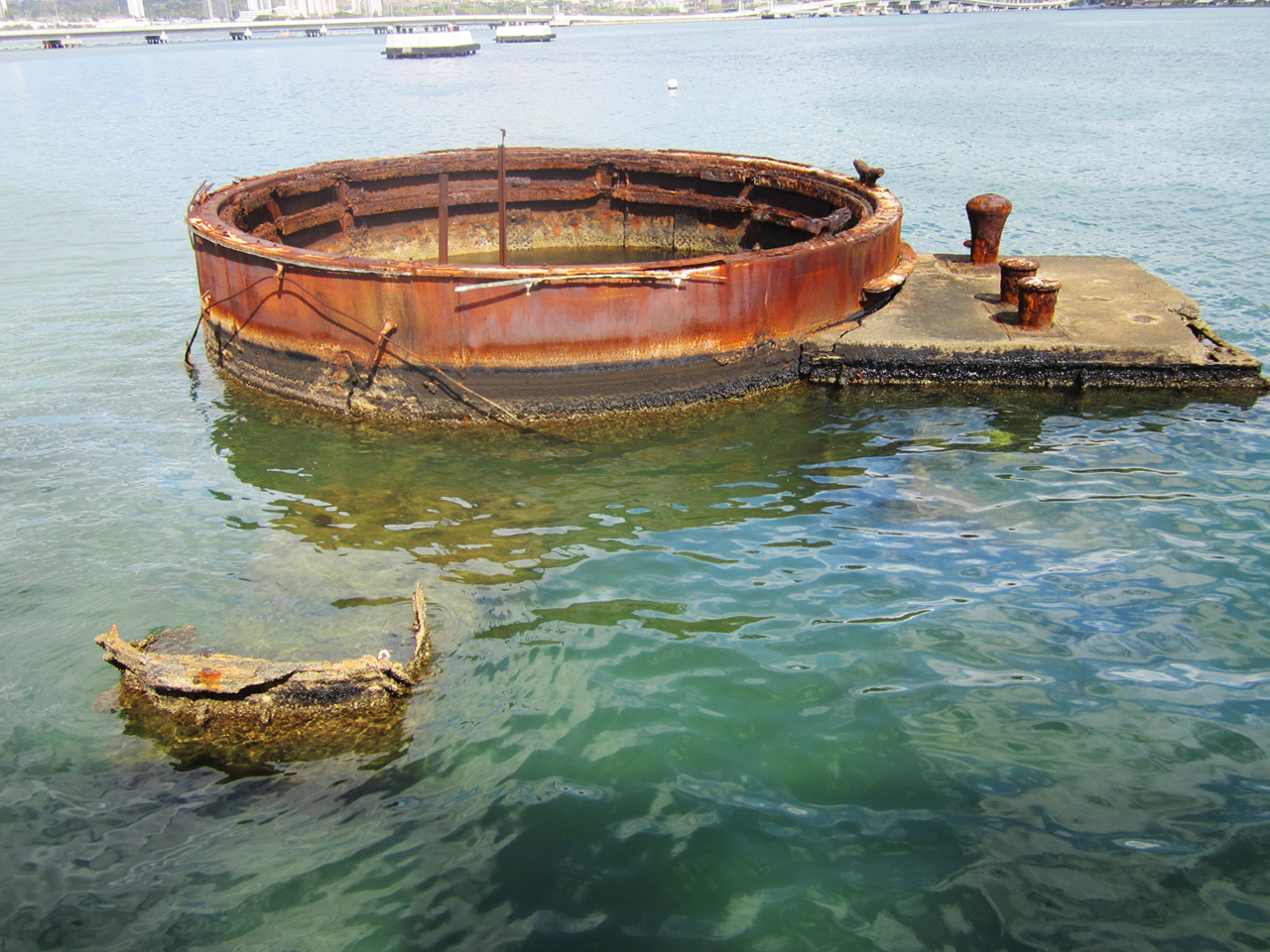The remains of the ship still in the water today. It has become a tomb for the people who went down with the ship years ago, very eery but also so calm in the harbour. 