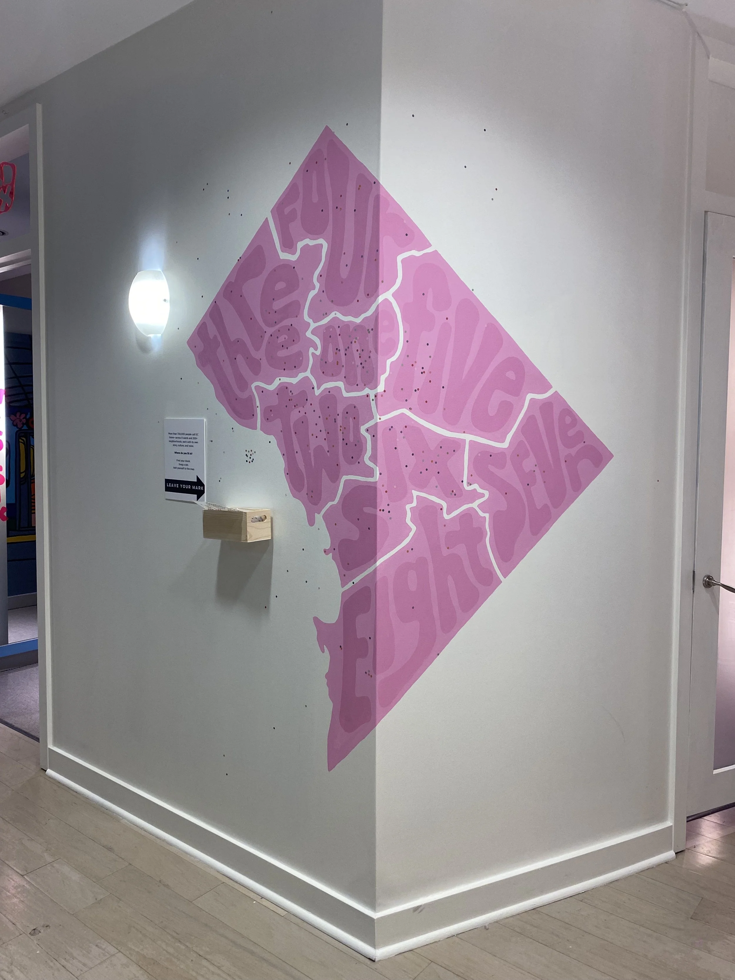 I designed and painted this DC map highlighting the 8 wards of DC. Guests get to add a small sticker dot to their location.