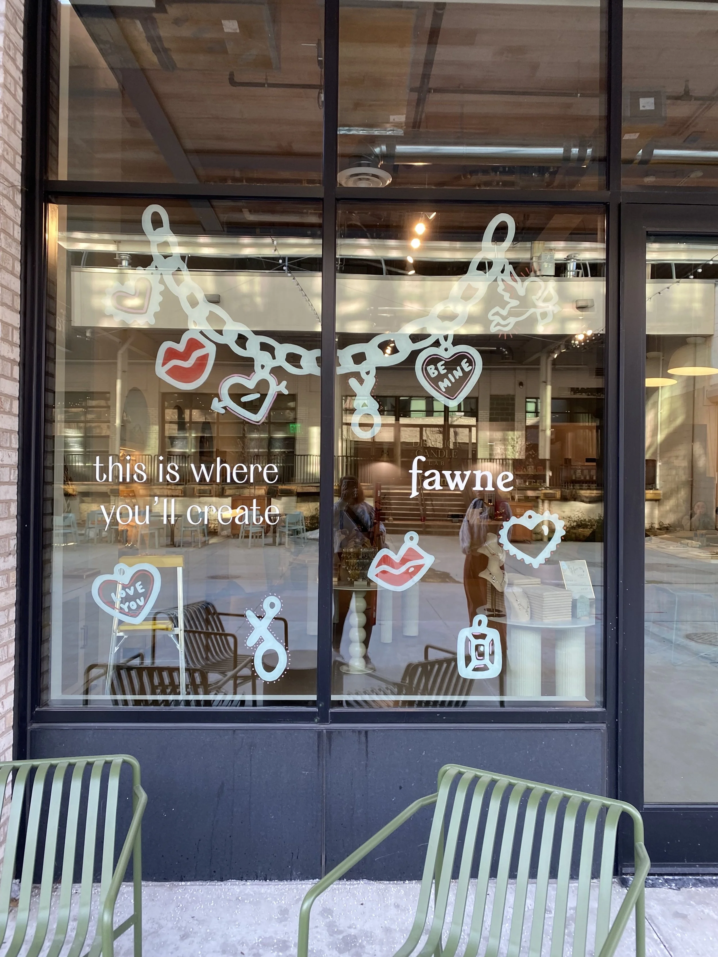 Custom window design for Valentine's Day for Fawne / District Candle Lab at Union Market, January 2025.