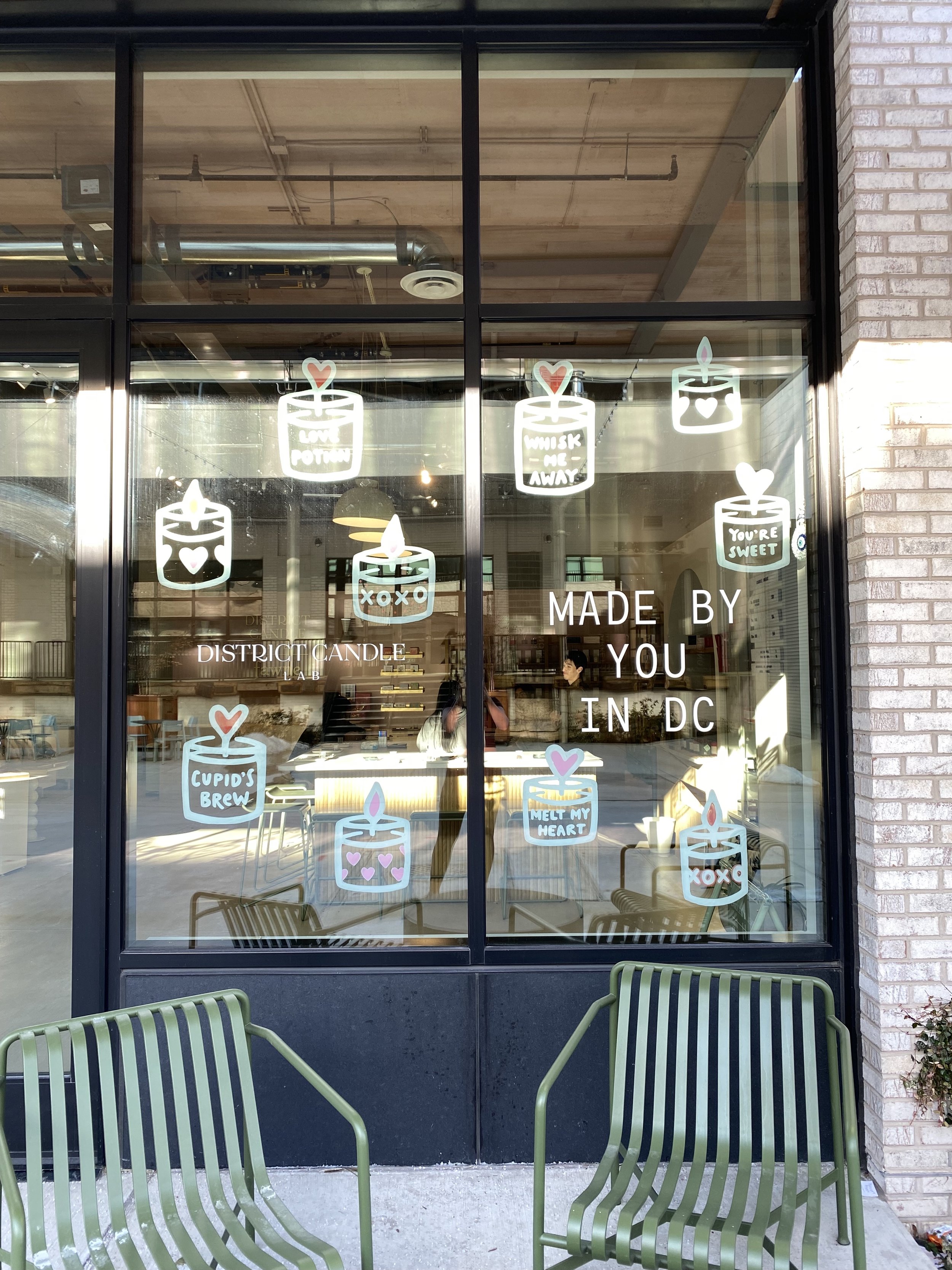 Custom window design for Valentine's Day for Fawne / District Candle Lab at Union Market, January 2025.