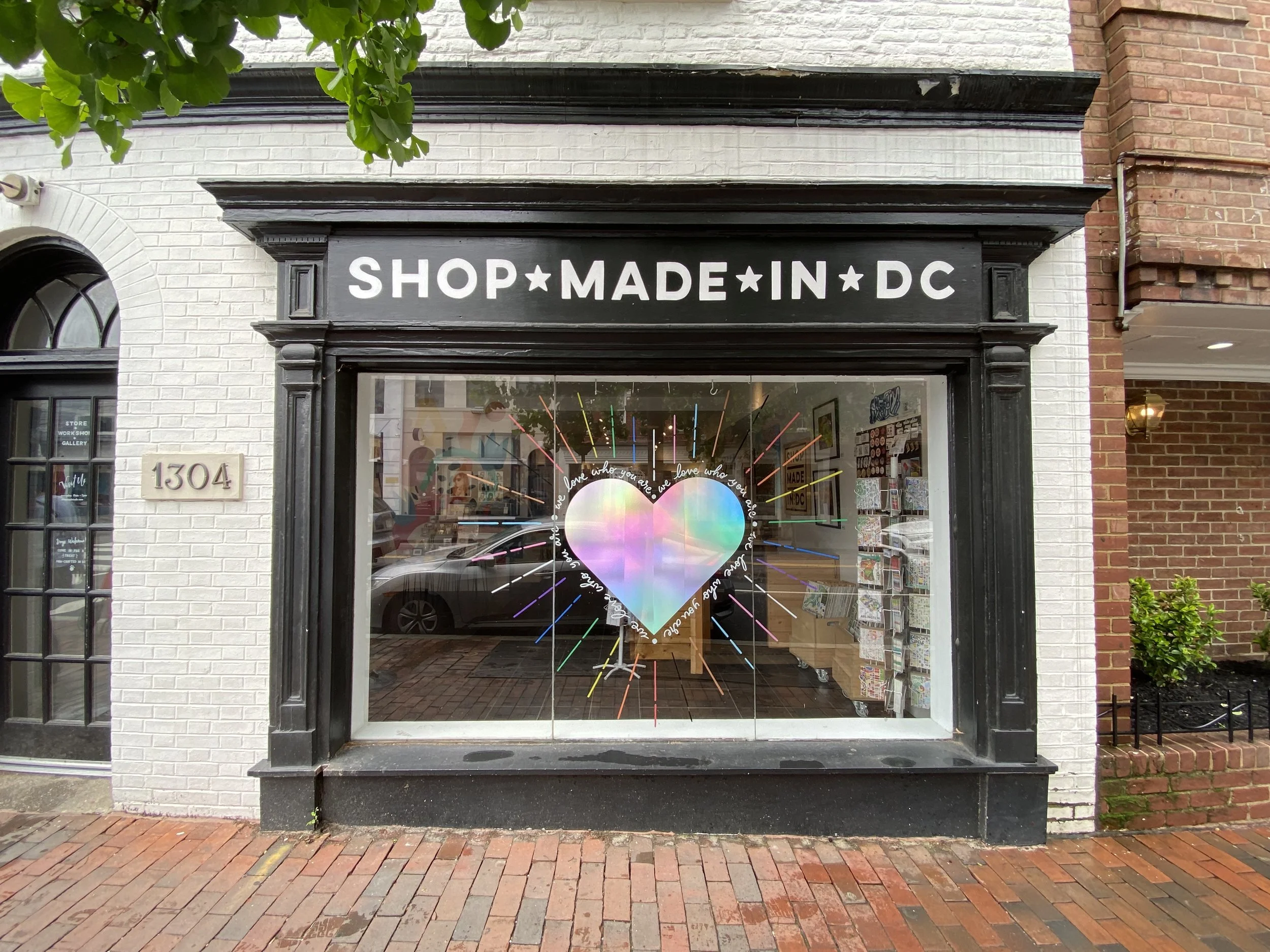 2025 Pride windows for Shop Made in DC Georgetown (I painted the rainbow rays and designed the vinyl graphics).