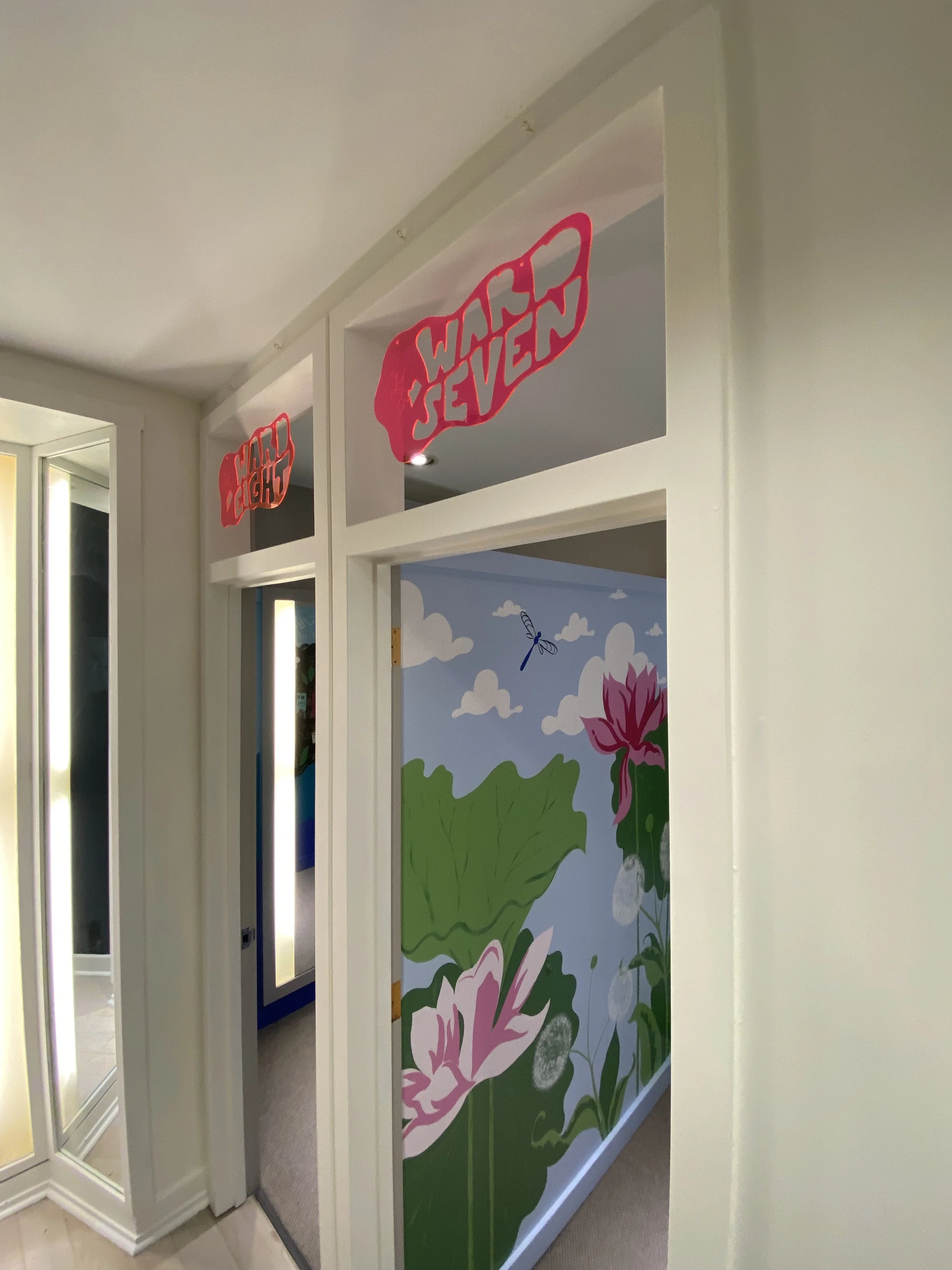 I designed, laser cut, and installed the pink acyrlic ward signs for each room.