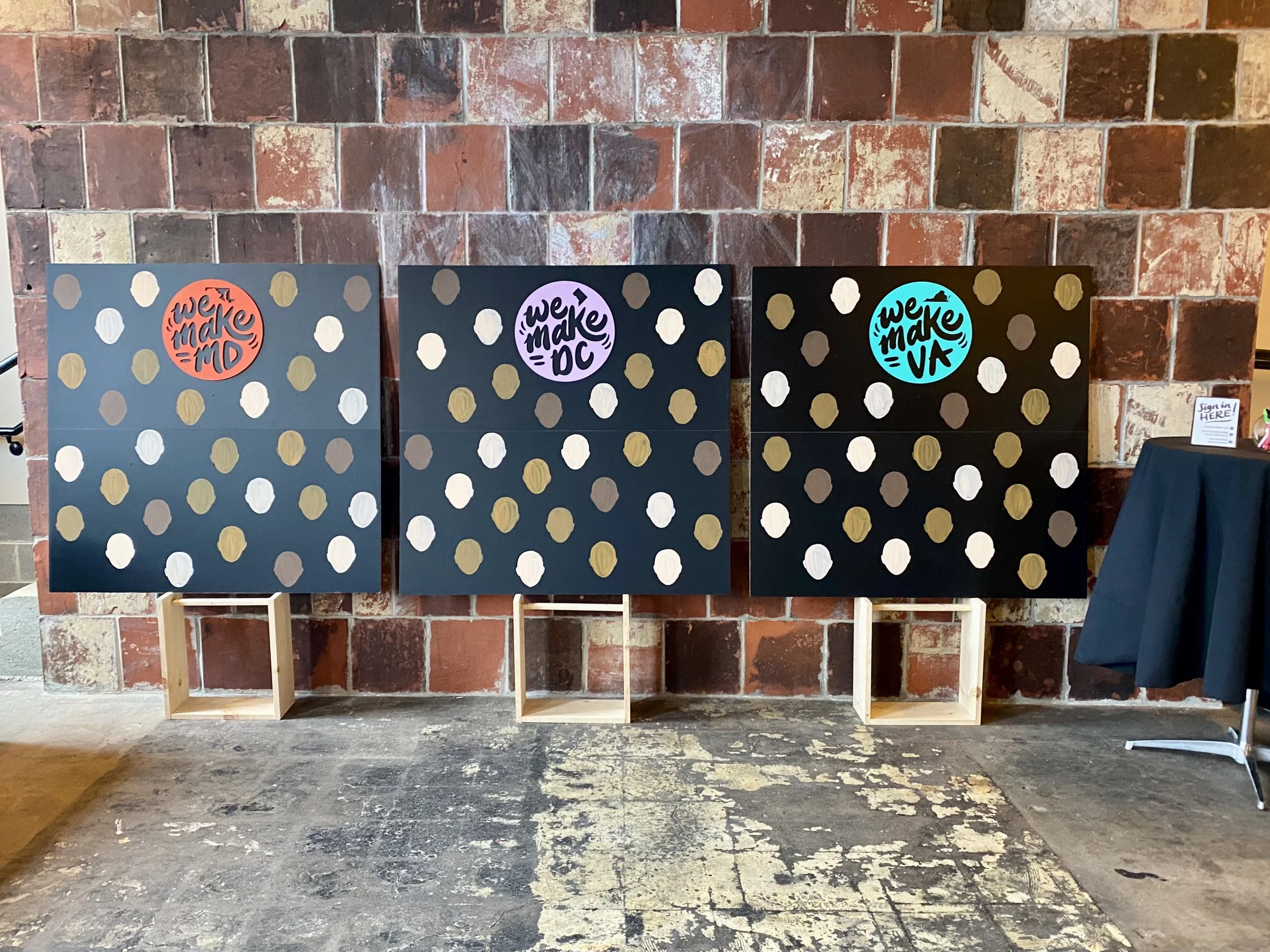 I hand painted faces onto chalkboard panels and added laser cut and painted title pieces; in addition to building chalk board stands for the display.