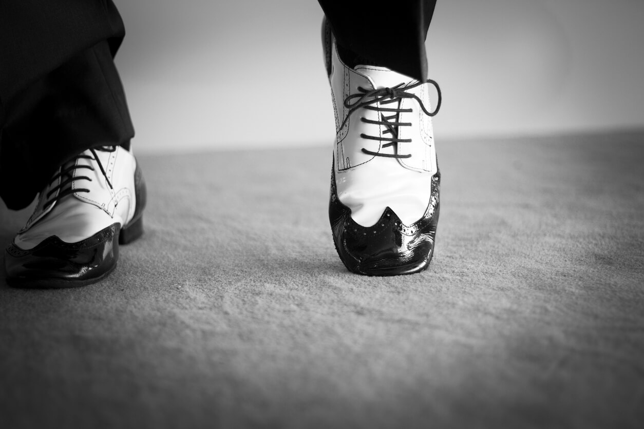 Ballroom Dancing. Tangoing couple taking ballroom dancing classes