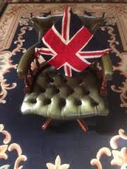 The British Green Leather desk swivel chair and flag.