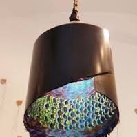 Modern Craft Metal Pendant, Green Blues illuminated inside.