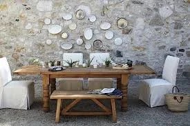 Inspiration dining furniture, use organic woods, layer textiles and chair style. Another feature would be to install a wood stove or cobblestone fireplace. 