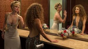 American Hustle - The Powder Room Scene. Here you can see the use of Yellow Hue, and undertones of the marigold. 