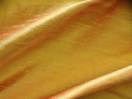 Shantung, in a golden yellow - raw texture fabric. 