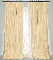 Shantung Drapery panels, notice how light reflective the fabric is. This makes shantung and other shiny fabrics a great choice for drapery. It's a natural textured fabric, so it not too stuffy in design - allowing for both contemporary everyday living style in many rooms of the house (from lounges to bedrooms). Another bonus is If you have pets, shantung and other faux silks will resist pet hair, so never be intimidated by shiny - embrace its effects. 