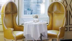 Weekend Coffee Corner - stunning birdcage chairs covered in a butter yellow shantung fabric. Delish! 