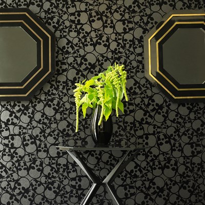 Sculls by Graham & Brown, Matte finish black paper with embossed velvet skull pattern. 