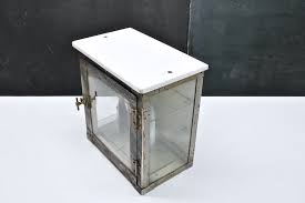 Metal Pharmacy Cabinet.