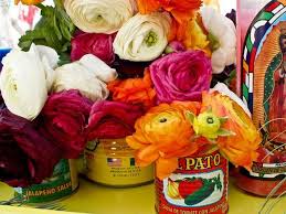 Create fresh posies in tomato cans, or mason jars!