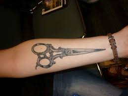 Symbol of the Hairdresser, scissors. 