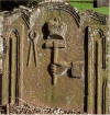 Symbols of the Blacksmith, the anvil-hammer-tongs.