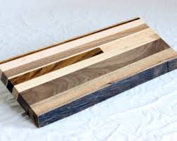 A custom wood square spindal could be created, then staining the grains to bring out the wood - dramatic! 
