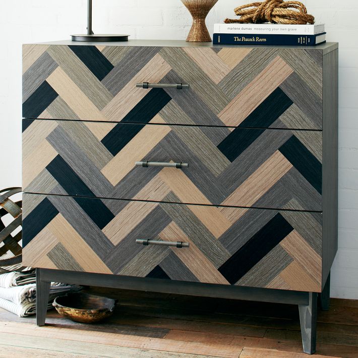 This dresser is from West Elm and makes a great side board for linens n' such. Love the movement with the herringbone pattern.