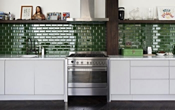 Subway Tile here in British Racing Green in a modern kitchen. 