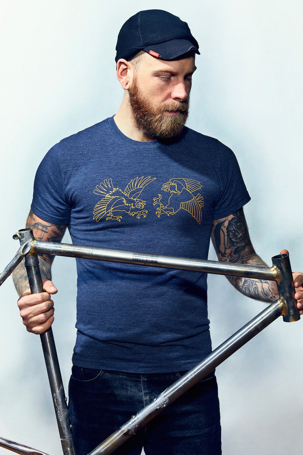 Mechanic-holding-bike-frame.jpg