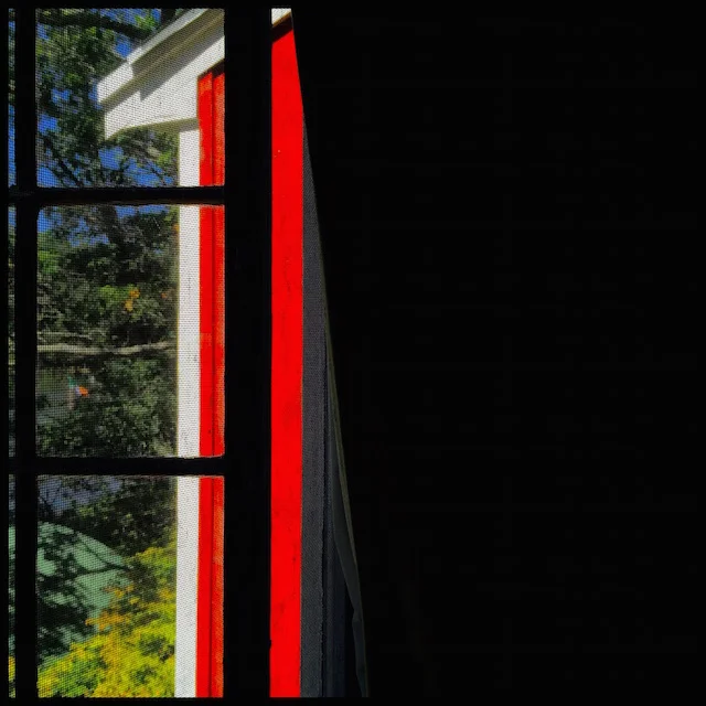 Window open, curtain drawn