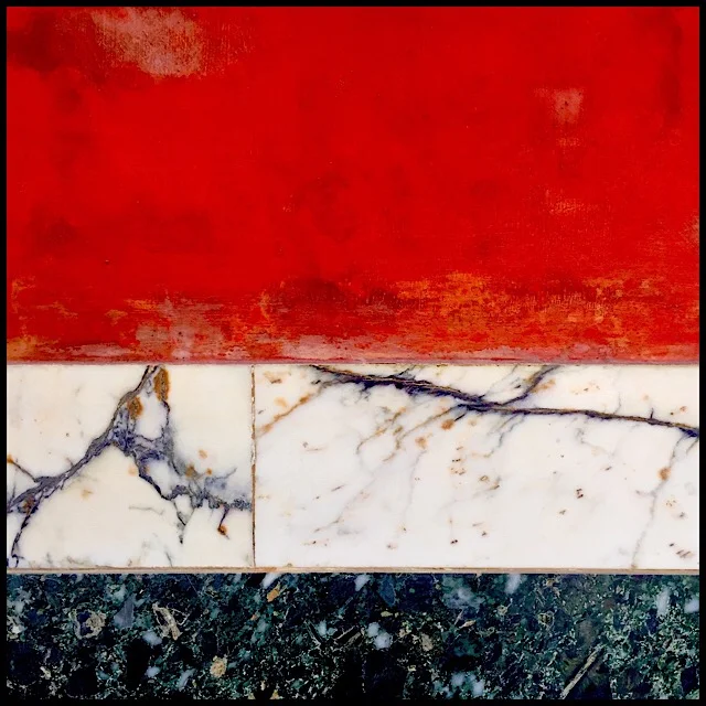 Wall detail in red, white, and black