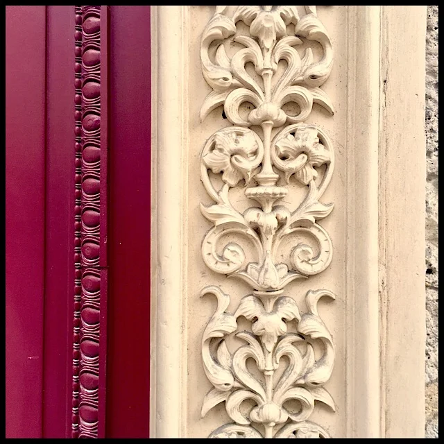 Exterior wall detail with vertical frieze