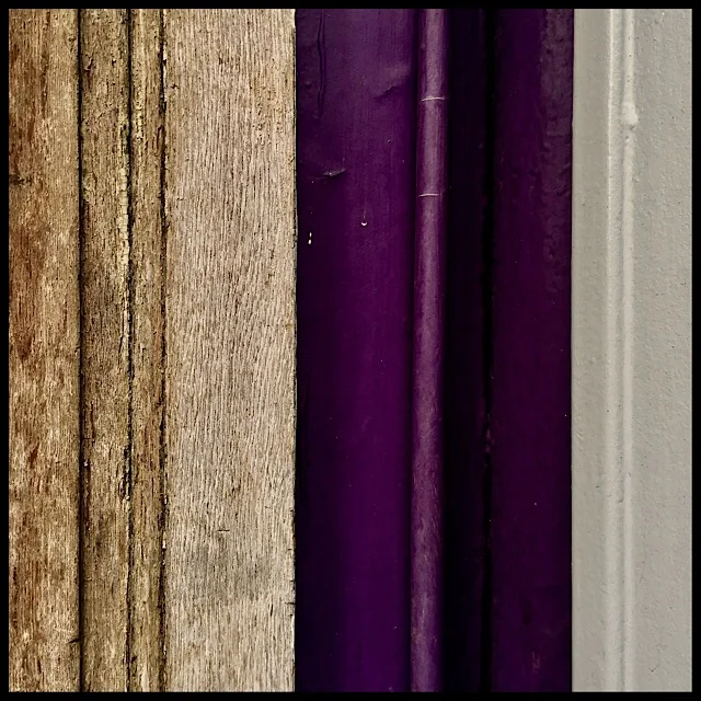Exterior wall detail with purple pipe