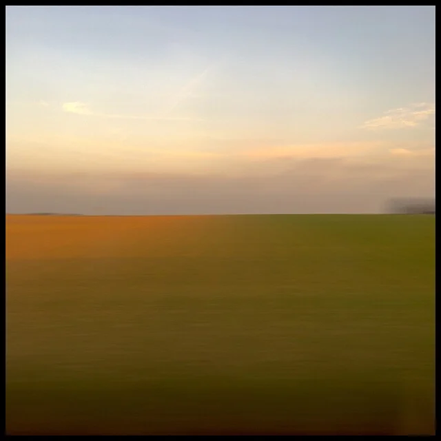 Rural landscape 17 at sunset from train gliding at 200 mph