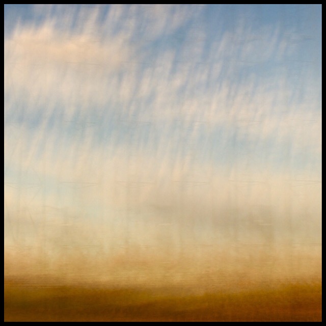 Rural landscape 1 at sunset from train gliding at 200 mph