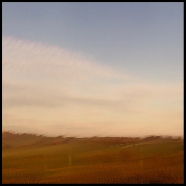 Rural landscape 5 at sunset from train gliding at 200 mph