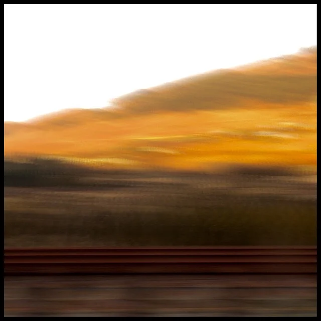 Rural landscape 10 at sunset from train gliding at 200 mph
