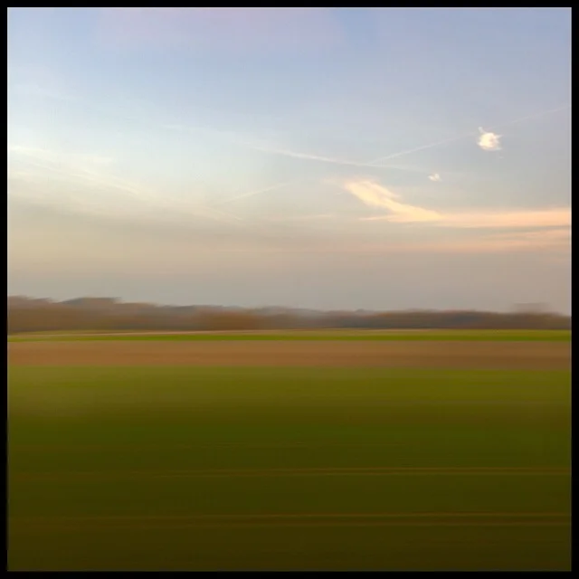 Rural landscape 13 at sunset from train gliding at 200 mph