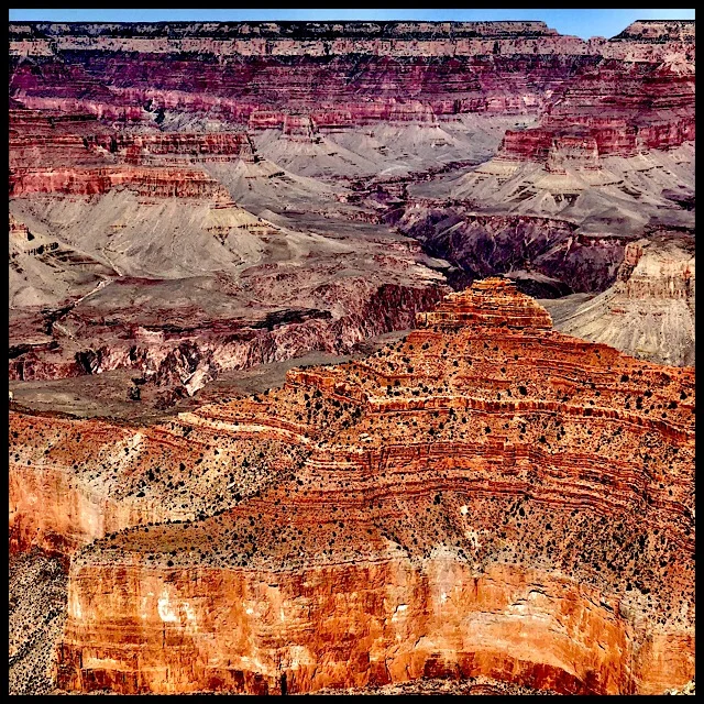 Canyon color layers with notched sky stripe