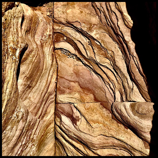 Wavy rock formation detail with natural perpendiculars