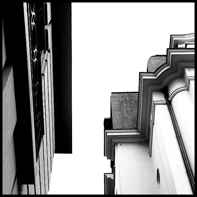 White shape between two buildings