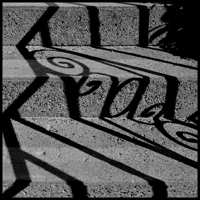 Railing shadow on steps