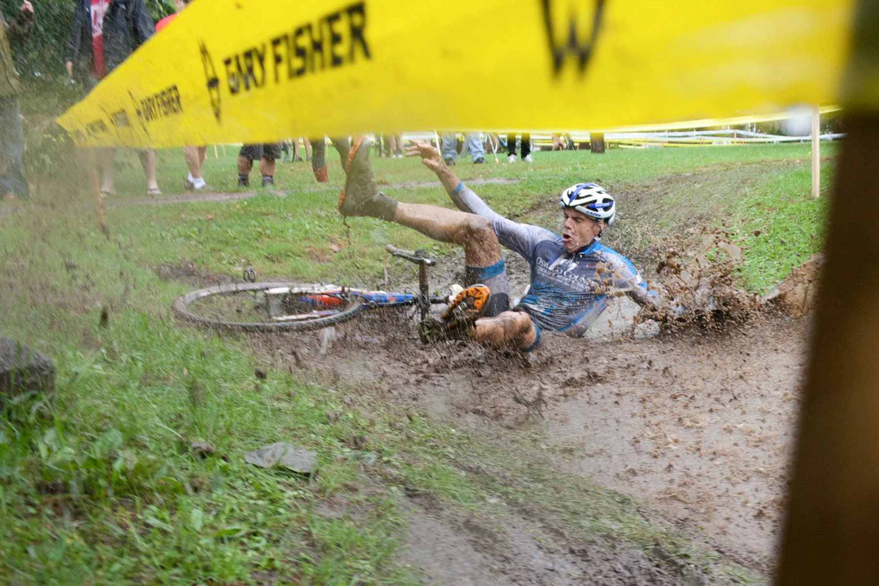 Gerald Visconti of the OCFCU Cycling Project takes a spill into a mud puddle during the Masters Men 40+ at the Cobb’s Hill cyclocross race on Sunday, Oct. 6, 2013, at Cobb’s Hill Park in Rochester, N.Y. Cyclocross consists of many laps in which cyclists ride over pavement, grass, steep hills, and obstacles in which they quickly dismount and navigate the obstruction. “They changed the course last minute, I went right into the water. Whoosh!” said Visconti.