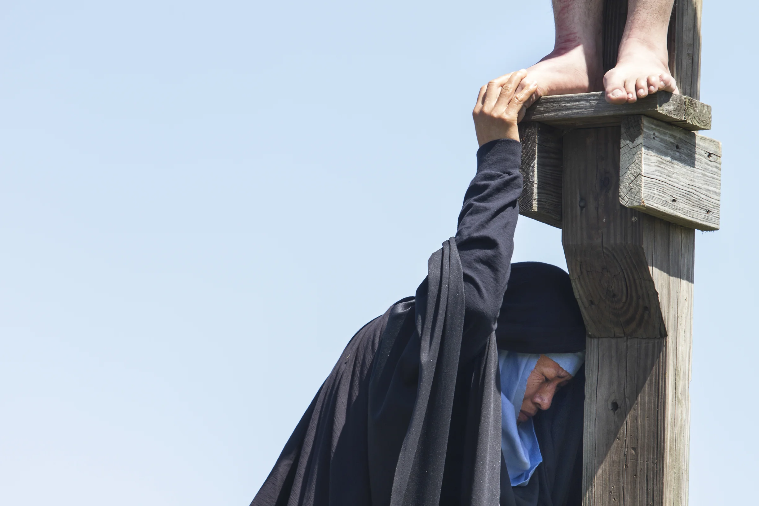 An actor portraying Mary reacts to the death of her Son.