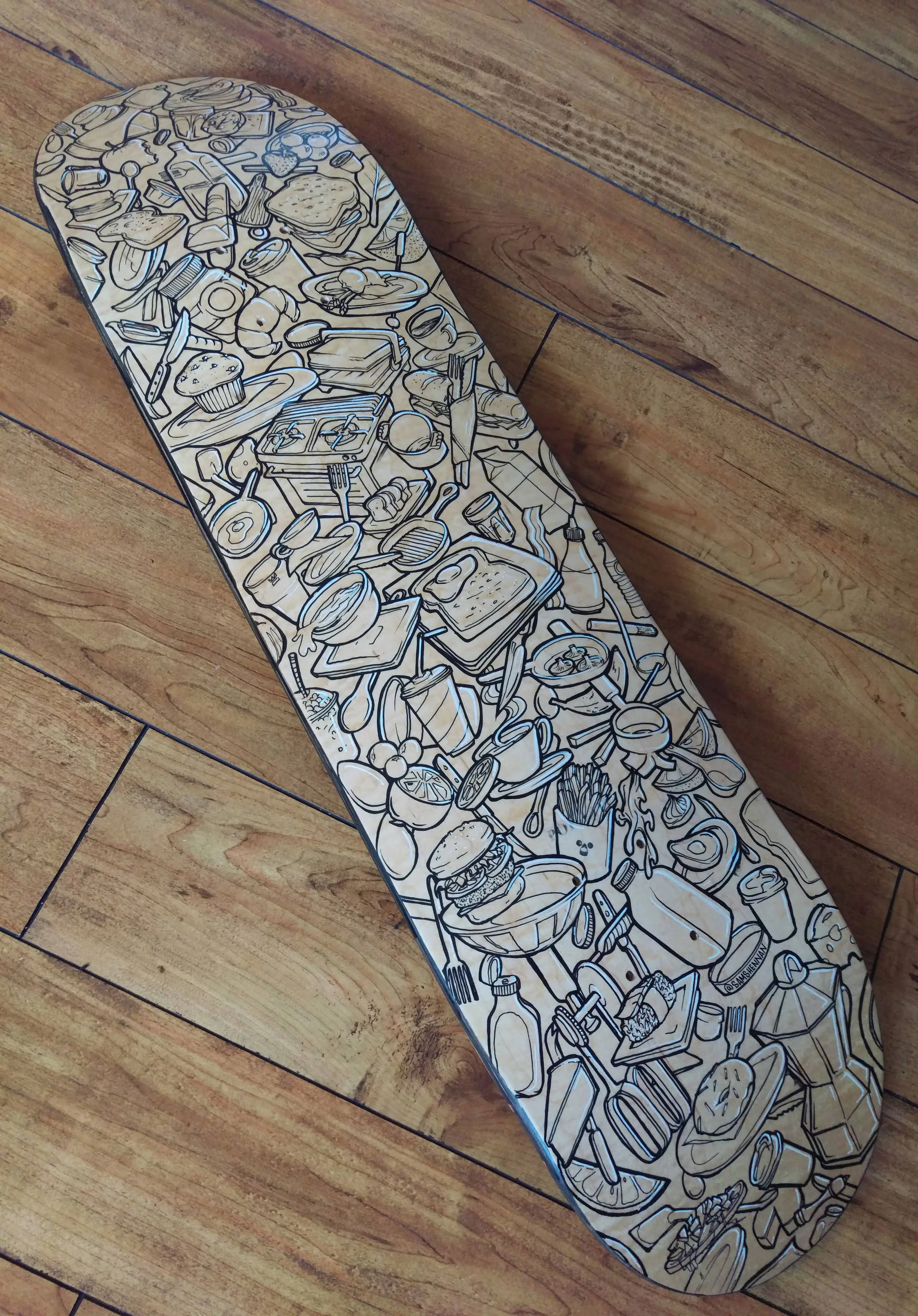 Highlights added in on  handpainted skateboard design